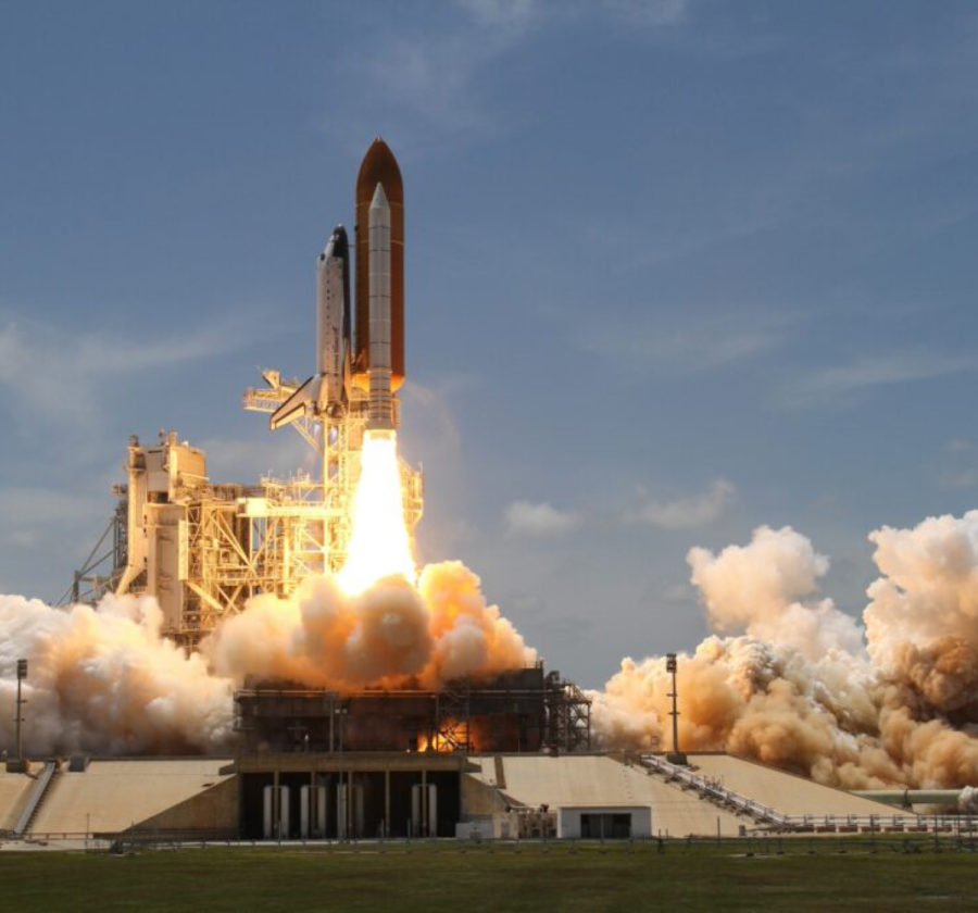 Space shuttle lifting off