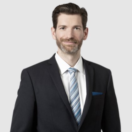 man in suit smiling