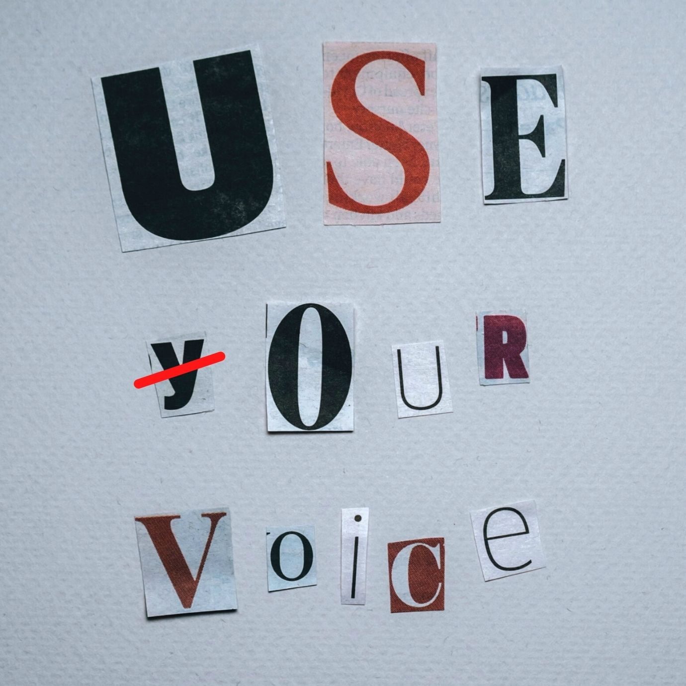newspaper cut outs spelling use your voice