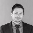 black and white picture of a man with suit